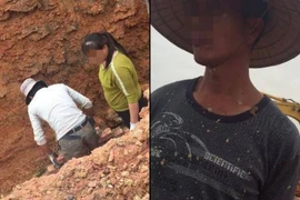 Nhóm người nước ngoài (che mặt) đã trực tiếp xuất hiện và làm việc tại công trường của ông Đào Văn Thanh từ ngày 18/1/2016 (Ảnh: PV/Vietnam+) 