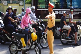 Nghị định 46 đi vào hoạt động liệu có góp phần cải thiện trật từ giao thông và nâng cao ý thức người tham gia giao thông? (Ảnh: Võ Phương/Vietnam+)