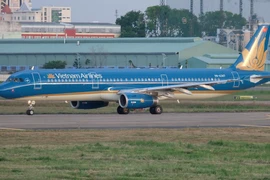 Máy bay của Hãng hàng không Vietnam Airlines tại một sân bay. (Ảnh: PV/Vietnam+)