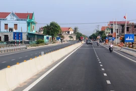 Một tuyến đường địa phương nối với cao tốc được nâng cấp, mở rộng. (Ảnh: Việt Hùng/Vietnam+)