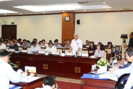 Các đại biểu tham gia thảo luận tại buổi tọa đàm. (Ảnh: Thanh Vũ/TTXVN)