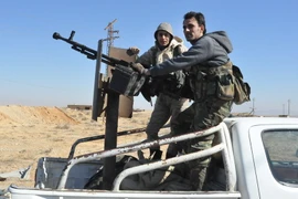 Ảnh tư liệu: Các lực lượng Syria trong chiến dịch chống IS ở tỉnh Homs ngày 7/2. (Nguồn: AFP/TTXVN)