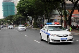 Cán bộ, chiến sỹ Cảnh sát giao thông ra quân bảo đảm trật tự, an toàn giao thông phục vụ Tuần lễ cấp cao APEC tại Đà Nẵng. (Ảnh: Trần Lê Lâm/TTXVN)