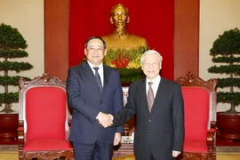 Tổng Bí thư Nguyễn Phú Trọng tiếp Phó Thủ tướng Lào Sonexay Siphandone đang thăm và làm việc tại Việt Nam. (Ảnh: Trí Dũng/TTXVN)