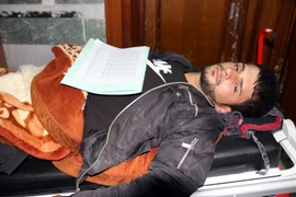 Nạn nhân trong trận động đất được điều trị tại một bệnh viện ở Sulaimaniyah, Iraq ngày 12/11. (Nguồn: AFP/TTXVN)