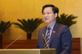 Tổng Thanh tra Chính phủ Lê Minh Khái trình bày Tờ trình về dự án Luật Phòng, chống tham nhũng (sửa đổi). (Ảnh: Phương Hoa/TTXVN)