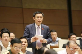 Phó Thủ tướng Vương Đình Huệ giải trình, làm rõ vấn đề đại biểu quốc hội nêu. (Ảnh: Phương Hoa/TTXVN)