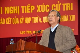 Ông Trần Quốc Vượng phát biểu tại buổi tiếp xúc cử tri huyện Lục Yên. (Ảnh: Tuấn Anh/TTXVN)
