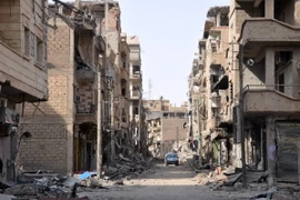 Cảnh đổ nát do xung đột ở thành phố miền đông Deir Ezzor ngày 4/11. (Nguồn: AFP/ TTXVN)