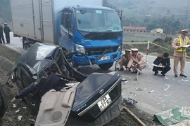 Hiện trường vụ tai nạn khiến 4 người thiệt mạng tại chỗ. (Ảnh: Nguyễn Chiến/TTXVN)