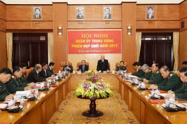Tổng Bí thư Nguyễn Phú Trọng, Bí thư Quân ủy Trung ương phát biểu khai mạc hội nghị. (Ảnh: Trí Dũng/TTXVN)