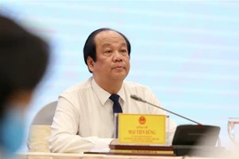 Chủ nhiệm Văn phòng Chính phủ, Người phát ngôn của Chính phủ Mai Tiến Dũng chủ trì Họp báo. (Ảnh: Dương Giang/TTXVN)