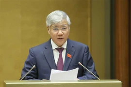 Bộ trưởng, Chủ nhiệm Ủy ban Dân tộc Đỗ Văn Chiến thừa ủy quyền của Thủ tướng Chính phủ trình bày Tờ trình về Chương trình mục tiêu quốc gia phát triển kinh tế-xã hội vùng đồng bào dân tộc thiểu số và miền núi giai đoạn 2021-2030. (Ảnh: Doãn Tấn/TTXVN)