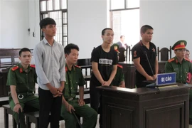 Các bị cáo tại phiên xét xử. (Ảnh: Nguyễn Thành/TTXVN)