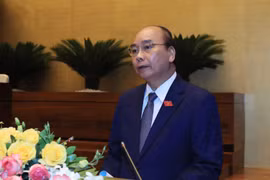 Thủ tướng Chính phủ Nguyễn Xuân Phúc trình bày Báo cáo về phòng, chống dịch Covid-19 và những nhiệm vụ, giải pháp trọng tâm phục hồi, phát triển kinh tế-xã hội. (Ảnh: Thống Nhất/TTXVN)