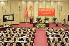 Quang cảnh phiên khai mạc kỳ họp thứ 13 Hội đồng Nhân dân thành phố Hà Nội khóa XIV. (Ảnh: An Đăng/TTXVN)