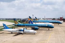Máy bay của 3 Hãng hàng không Vietnam Airlines, Pacific Airlines và VASCO tại sân bay Nội Bài. (Ảnh: CTV/Vietnam+)