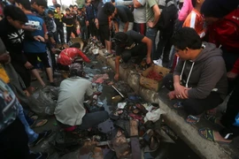 Hiện trường các vụ tấn công ở Sadr City ngày 28/2. (Ảnh: AFP/TTXVN)