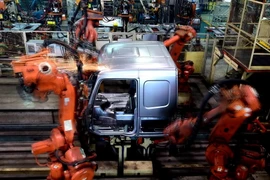 Hoạt động sản xuất tại nhà máy ở Tế Nam, thủ phủ tỉnh Sơn Đông, miền đông Trung Quốc. (Ảnh: THX/TTXVN) 