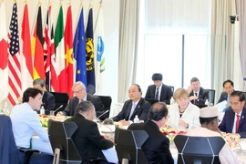 Đoàn đại biểu Việt Nam do Thủ tướng Nguyễn Xuân Phúc dẫn đầu tham dự hội nghị. (Ảnh: Thống Nhất/TTXVN)