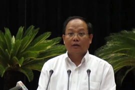 Phó Bí thư Thường trực Thành ủy TP Hồ Chí Minh Tất Thành Cang. (Ảnh: Hoàng Hải/TTXVN)