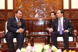 Chủ tịch nước Trần Đại Quang tiếp Đại sứ Vương quốc Campuchia tại Việt Nam Hul Phany đến chào từ biệt, kết thúc nhiệm kỳ công tác tại Việt Nam. (Ảnh: Nhan Sáng/TTXVN)