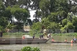 Sông Vàm Cỏ Đông. (Ảnh: Phạm Thanh Tân/TTXVN)