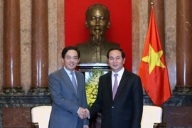 Chủ tịch nước Trần Đại Quang tiếp Đại sứ Trung Quốc tại Việt Nam Hồng Tiểu Dũng đến chào xã giao. (Ảnh: Nhan Sáng/TTXVN)