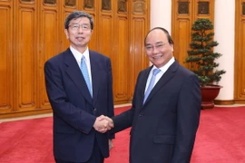 Thủ tướng Nguyễn Xuân Phúc tiếp ông Takehiko Nakao, Chủ tịch Ngân hàng Phát triển châu Á. (Ảnh: Thống Nhất/TTXVN) 
