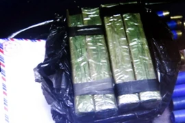 Tang vật thu được của một vụ vận chuyển ma túy. (Ảnh: Văn Đạt/TTXVN)