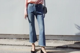 Sơ mi và quần lửng ống loe là bộ đôi lý tưởng cho phái đẹp công sở, chiều lòng những quý cô mê đắm phong cách thanh lịch, nhã nhặn. (Nguồn: Đẹp/Vietnam+)