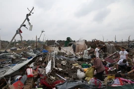 Cảnh đổ nát sau trận mưa bão tại huyện Phụ Ninh, thành phố Diêm Thành, tỉnh Giang Tô ngày 24/6. (Ảnh: THX/TTXVN)