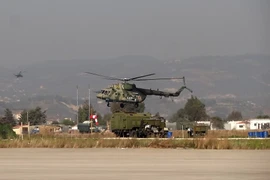 Máy bay trực thăng tại căn cứ quân sự Nga ở tỉnh Latakia ngày 16/2 vừa qua. (Ảnh: AFP/TTXVN)