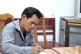 Phan Văn Út tại Cơ quan điều tra. (Ảnh: TTXVN phát)