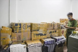 Thuốc lá lậu được lực lượng Công an phát hiện trong vụ án. (Ảnh: TTXVN phát)
