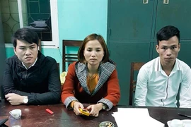 Các đối tượng tại cơ quan điều tra. (Ảnh: TTXVN phát)