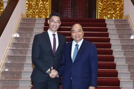 Thủ tướng Nguyễn Xuân Phúc tiếp chuyên gia kinh tế Philipp Rösler nhân chuyến thăm và làm việc tại Việt Nam. (Ảnh: Thống Nhất/TTXVN)