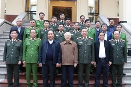 Tổng Bí thư, Chủ tịch nước Nguyễn Phú Trọng, Thủ tướng Chính phủ Nguyễn Xuân Phúc và các đại biểu dự Hội nghị. (Ảnh: Trí Dũng- TTXVN)