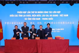 Quang cảnh lễ ký Biên bản ghi nhớ Hội nghị lần thứ VII của lãnh đạo 4 tỉnh biên giới phía Việt Nam với tỉnh Vân Nam (Trung Quốc). (Ảnh: Quý Trung/TTXVN)