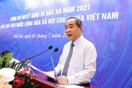 Ông Lê Khánh Hải, Ủy viên Trung ương Đảng, Bộ trưởng, Chủ nhiệm Văn phòng Chủ tịch nước, công bố Quyết định về đặc xá năm 2021 của Chủ tịch nước. (Ảnh: Phạm Kiên/TTXVN)