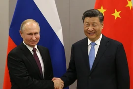 Tổng thống Nga Vladimir Putin và Tổng Bí thư Đảng Cộng sản Trung Quốc Tập Cận Bình. (Nguồn: eturbonews.com)