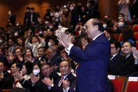 Chủ tịch nước Nguyễn Xuân Phúc tại Chương trình nghệ thuật kỷ niệm 30 năm quan hệ Việt Nam-Hàn Quốc. (Ảnh: Thống Nhất/TTXVN)