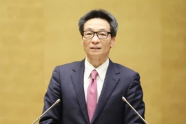 Ủy viên Trung ương Đảng, Phó Thủ tướng Chính phủ Vũ Đức Đam truyền đạt chuyên đề “Định hướng tổng thể quốc gia thời kỳ 2021-2030, tầm nhìn đến năm 2050.” (Ảnh: Phương Hoa/TTXVN)