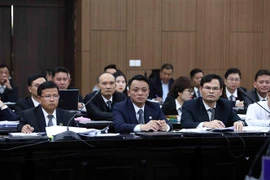 Luật sư bào chữa cho các bị cáo tại phiên tòa. (Ảnh: Phạm Kiên/TTXVN)