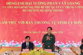 Đại tướng, Bộ trưởng Quốc phòng Phan Văn Giang làm việc với Ban Thường vụ Tỉnh ủy Sơn La. (Ảnh: Trọng Đức/TTXVN)