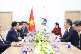 Thủ tướng Phạm Minh Chính gặp Chủ tịch Hội đồng Ủy ban Kinh tế Á-Âu (EEK) Bakytzhan Sagintayev. (Ảnh: Dương Giang/TTXVN)