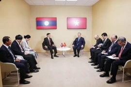 Tổng Bí thư, Chủ tịch nước Tô Lâm tiếp xúc song phương với Tổng Bí thư, Chủ tịch nước Lào Thongloun Sisoulith. (Ảnh: Trí Dũng/TTXVN)