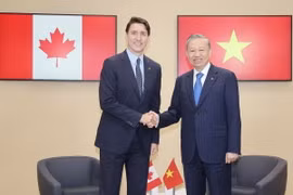 Tổng Bí thư, Chủ tịch nước Tô Lâm tiếp xúc song phương với Thủ tướng Canada Justin Trudeau. (Ảnh: Trí Dũng/TTXVN)