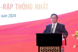 Thủ tướng Phạm Minh Chính phát biểu tại buổi gặp cán bộ, nhân viên Đại sứ quán và đại diện cộng đồng người Việt Nam tại UAE. (Ảnh: Dương Giang/TTXVN)