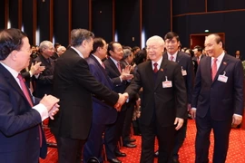 Tổng Bí thư, Chủ tịch nước Nguyễn Phú Trọng và Ủy viên Bộ Chính trị, Thủ tướng Chính phủ Nguyễn Xuân Phúc dự phiên khai mạc Đại hội. (Ảnh: TTXVN)